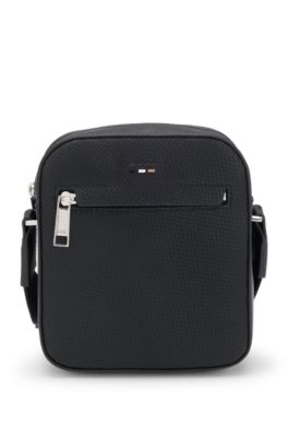 Reporter bag in faux leather with monogram-embossed panels, Black