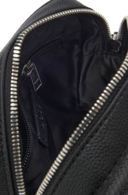 Reporter bag in faux leather with monogram-embossed panels, Black