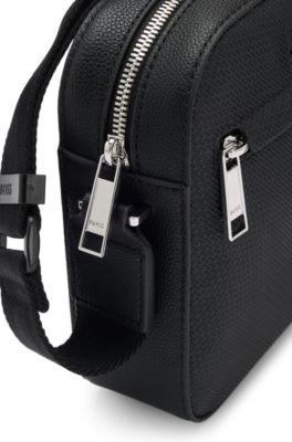 Reporter bag in faux leather with monogram-embossed panels, Black