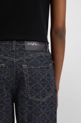 Jean tr&egrave;s large en denim &agrave; monogramme imprim&eacute; au laser, Bleu fonc&eacute;