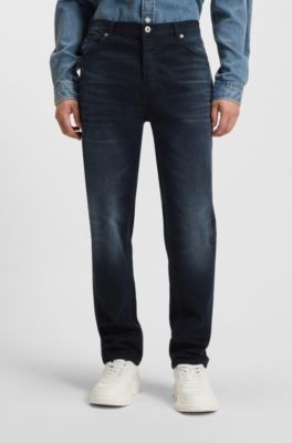 Jeans tapered fit de denim el&aacute;stico azul-negro, Azul oscuro