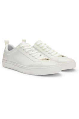 Faux-leather trainers with tonal monograms, White
