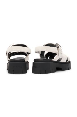 Suede sandals with buckled strap and chunky sole, White