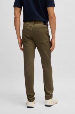 Vaqueros Porsche x BOSS tapered fit de tejido vaquero el&aacute;stico t&eacute;cnico, Verde oscuro