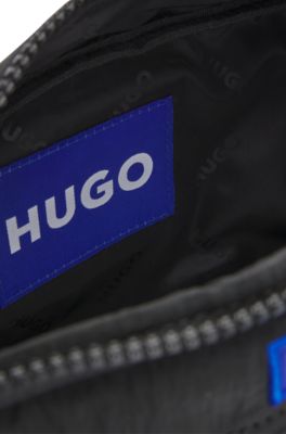 Reporter bag with blue logo label, Black