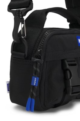 Reporter bag with blue logo label, Black