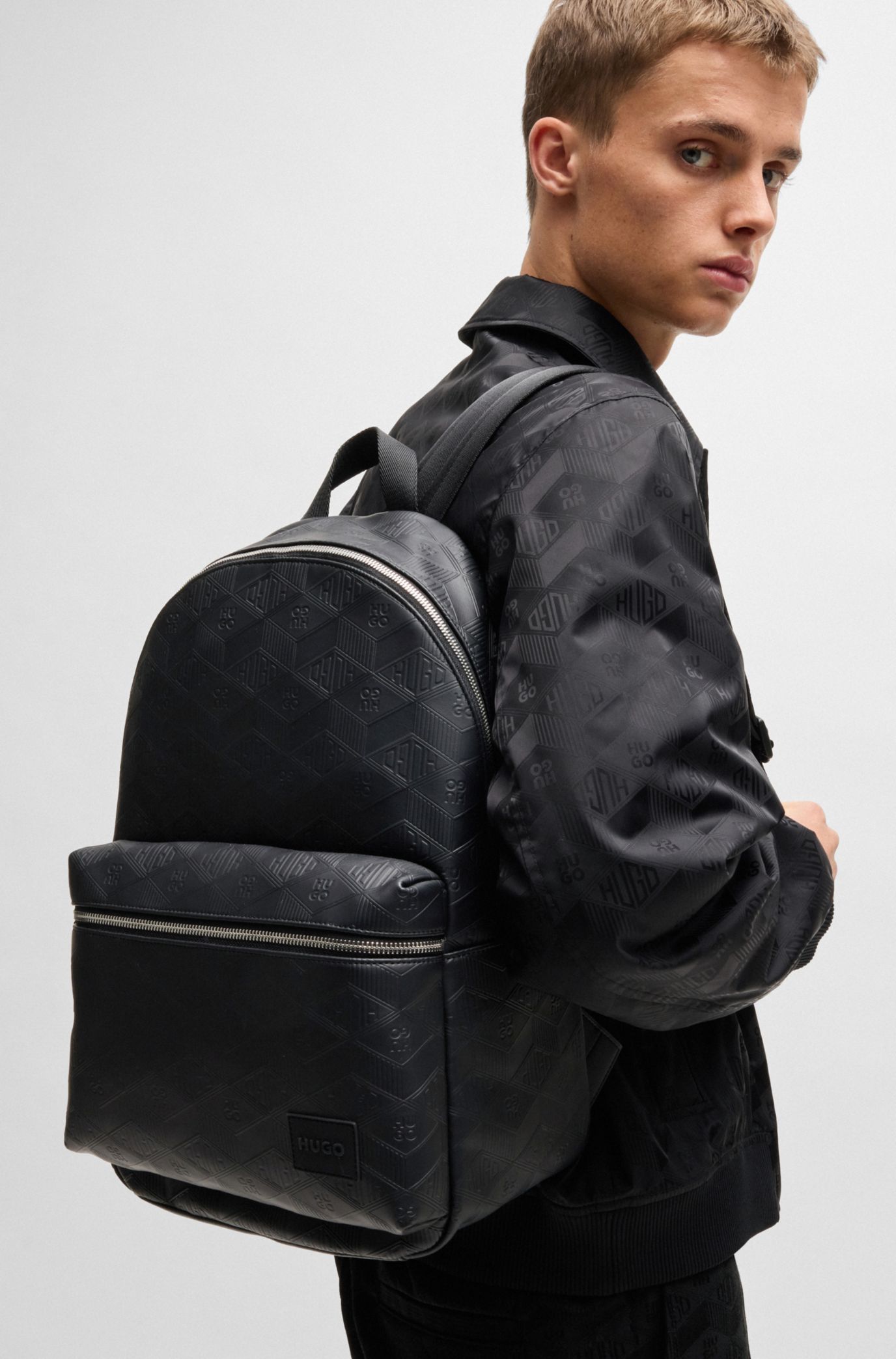 【関税込み】Hugo ブラック ロゴ パターン バックパック BOSS - Backpack with monogram-patterned pocket - Black