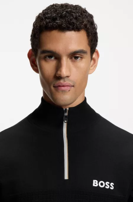 Sleeveless cotton-blend sweater with zip neck