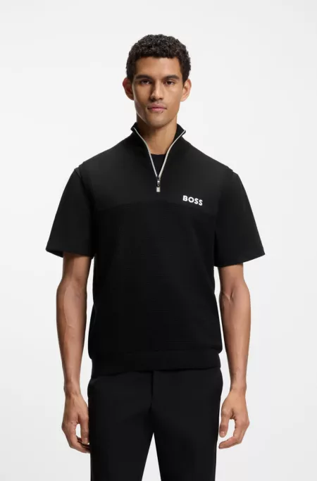 Sleeveless cotton-blend sweater with zip neck