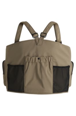 Vest-style backpack with multiple pockets, Brown