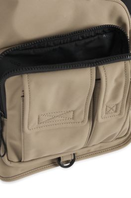 Vest-style backpack with multiple pockets, Brown