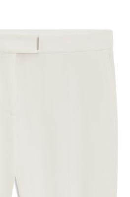 Pantalones slim fit con aberturas en los dobladillos, Blanco