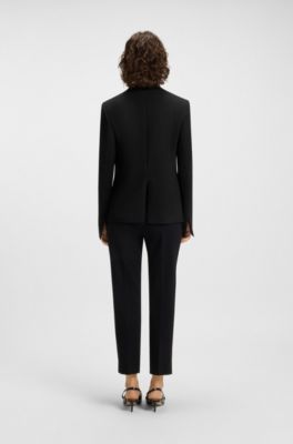 Blazer regular fit sin cuello con bot&oacute;n met&aacute;lico, Negro