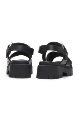 Leather sandals with buckled strap and chunky sole, Black
