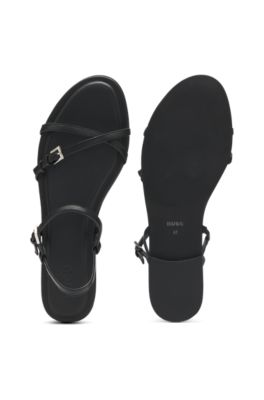 Sandalias planas en piel de napa con hebillas con logo, Negro