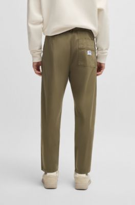 Tapered-fit trousers in stretch-cotton twill, Light Green