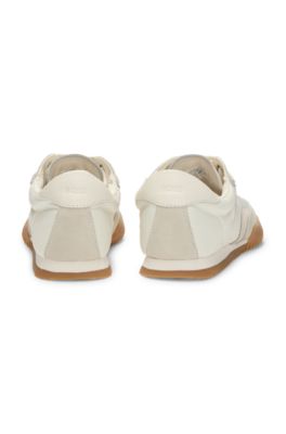 Low-top trainers in fabric and suede, White