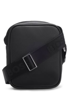 Reporter bag with monogram-patterned front pocket, Black