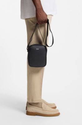 Reporter bag with monogram-patterned front pocket, Black