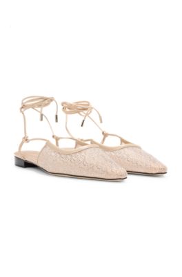 Mesh mules with rhinestone embellishments, light pink