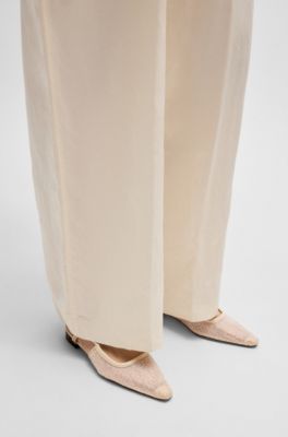 Mesh mules with rhinestone embellishments, light pink