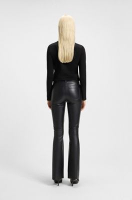 Flared trousers in faux leather, Black