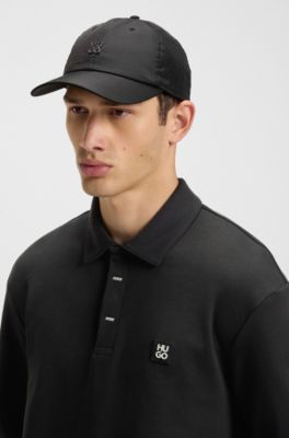 Covered-placket sweatshirt in a polo style, Black