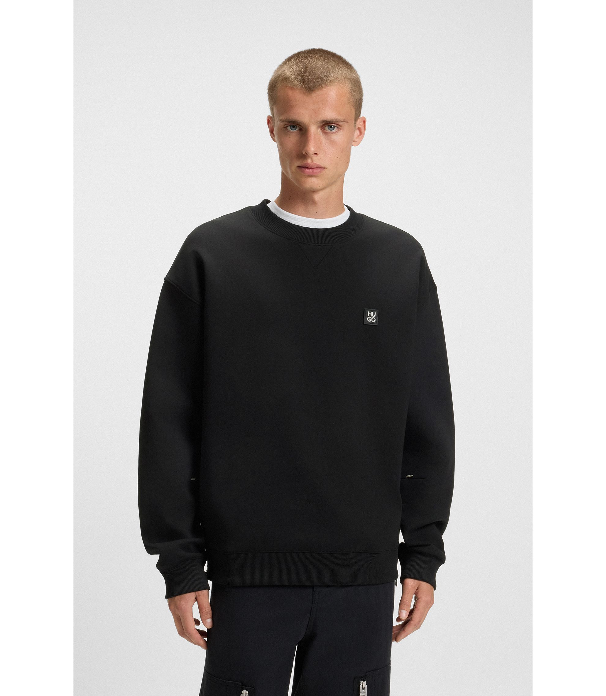 HUGO - Stacked-logo sweatshirt in a cotton blend - Black