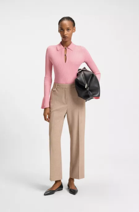 Knit sweater with stacked-logo placket links