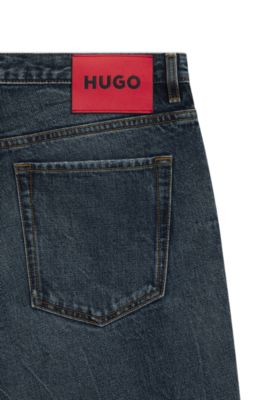 Jeans tapered fit de denim azul lavado a la piedra, Azul