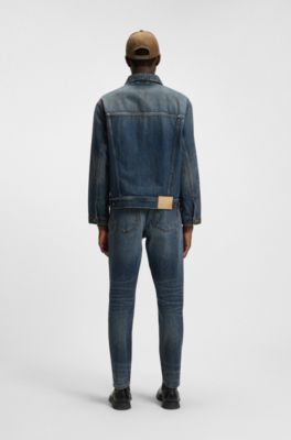 Jeans tapered fit de denim azul lavado a la piedra, Azul