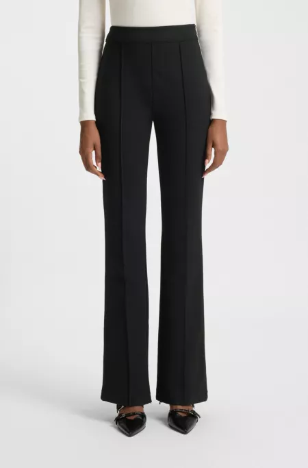 Flared trousers in stretch fabric