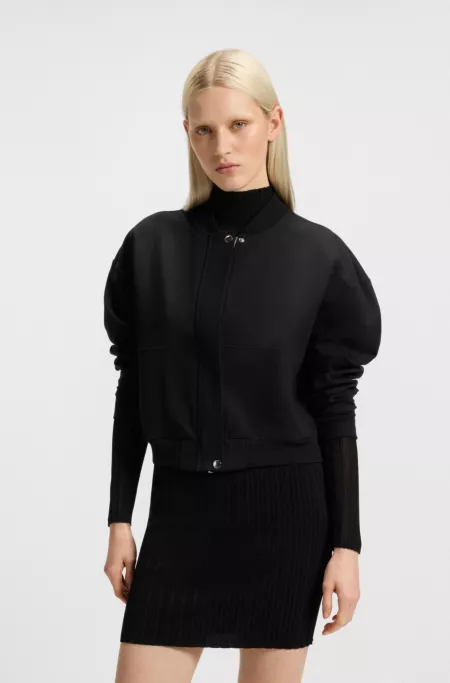 Stretch bomber jacket with concealed closure