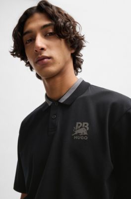 Polo HUGO&nbsp;x&nbsp;RB en coton stretch avec logo en carbone, Noir
