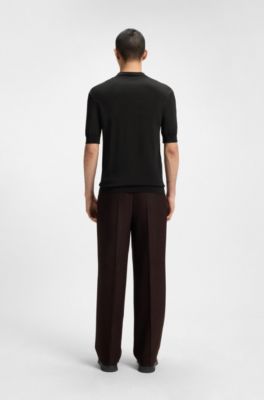 Polo en maille avec encolure zipp&eacute;e et d&eacute;tails jacquard, Noir