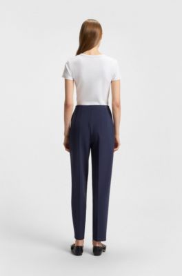 Pantalones regular fit en tejido el&aacute;stico con pernera carrot, Azul oscuro