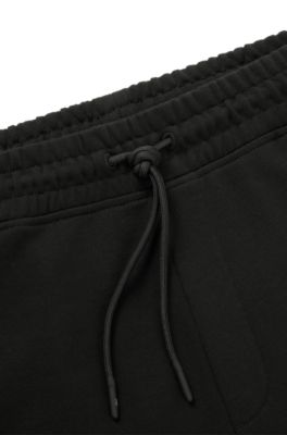Shorts HUGO x RB en felpa de algod&oacute;n con logo en carbono sutil, Negro