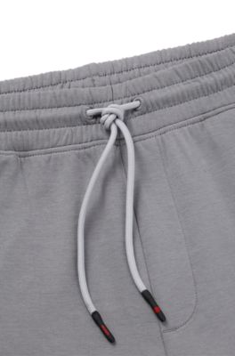 Pantalones de ch&aacute;ndal de mezcla de algod&oacute;n HUGO x RB con detalles de ribetes, Gris oscuro