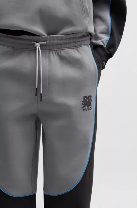 HUGO x RB tracksuit bottoms with piping details