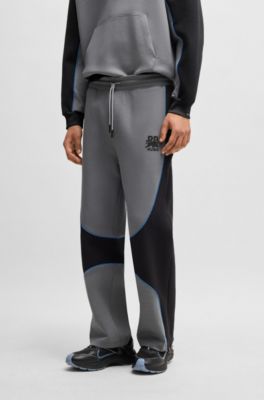 Pantalones de ch&aacute;ndal de mezcla de algod&oacute;n HUGO x RB con detalles de ribetes, Gris oscuro