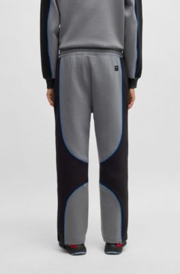 Pantalones de ch&aacute;ndal de mezcla de algod&oacute;n HUGO x RB con detalles de ribetes, Gris oscuro