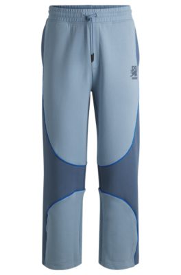 Pantalones de ch&aacute;ndal de mezcla de algod&oacute;n HUGO x RB con detalles de ribetes, Azul