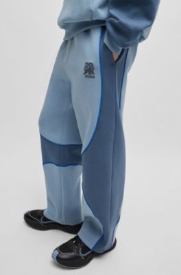 Pantalones de ch&aacute;ndal de mezcla de algod&oacute;n HUGO x RB con detalles de ribetes, Azul
