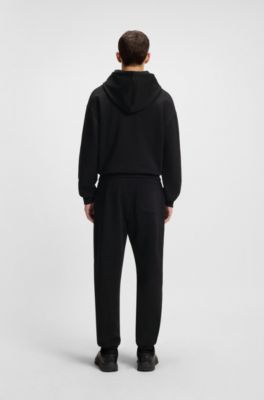 Split-logo tracksuit bottoms in cotton terry, Black