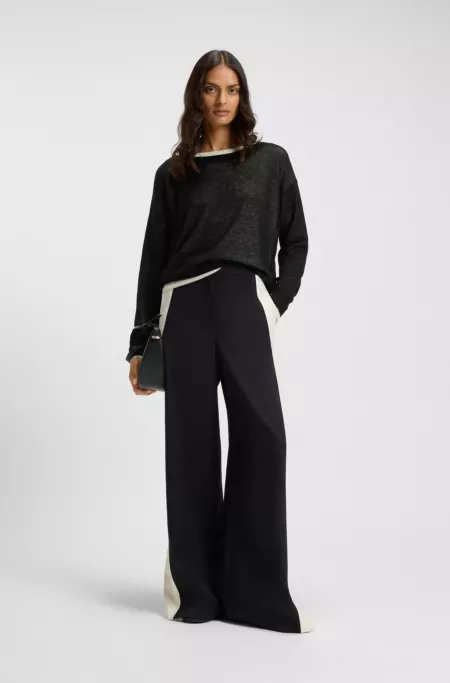 Knitted sweater with layered design