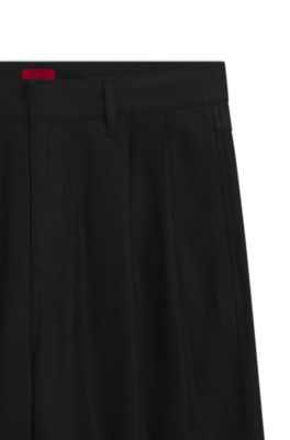 Black relaxed-fit jeans in waxed denim, Black