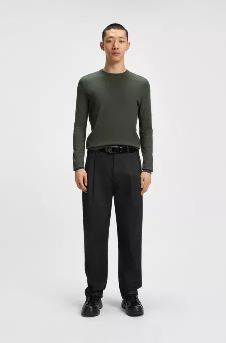 Black relaxed-fit jeans in waxed denim