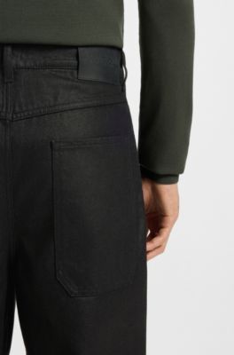 Black relaxed-fit jeans in waxed denim, Black