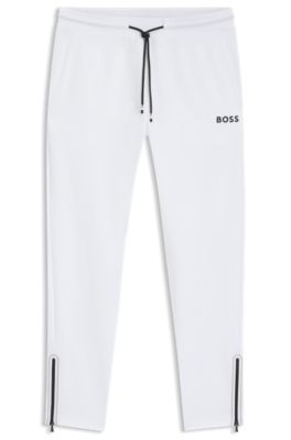 Active stretch-gabardine tracksuit bottoms with thermoregulating technology, White