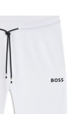 Active stretch-gabardine tracksuit bottoms with thermoregulating technology, White
